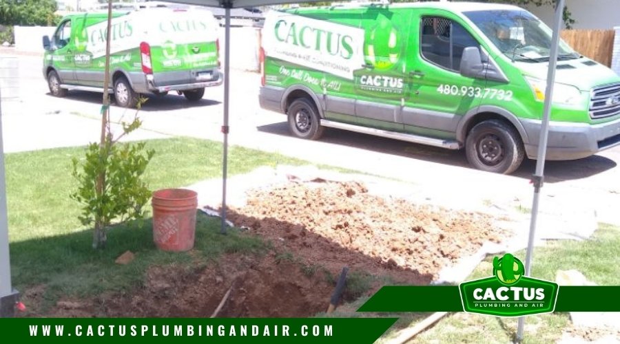 Cactus Plumbing And Air van providing plumbing repair service for basement leaks